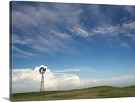 Windmill in field