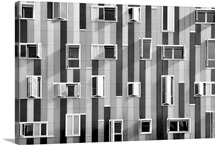 Windows in modern building with unusual distribution.
