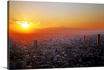 Winter sunset over Tokyo with Mount Fuji in distance, Japan