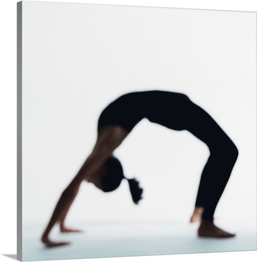 Woman in yoga backbend pose