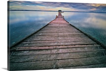 Wooden pier at sunset.