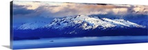 A Panoramic of A Lone Fishing Boat Pulling Into Homer Bay at Sunrise