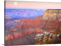 Full moon over the Grand Canyon at sunset as seen from Pima Point Arizona