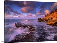 Surf crashing on rocks at Keoneloa Bay Maui Hawaii