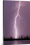 Cloud to ground lightning strike during intense summer thunderstorm
