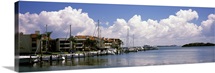 Boats docked in a bay Cabbage Key Sunshine Skyway Bridge in Distance Tampa Bay Florida