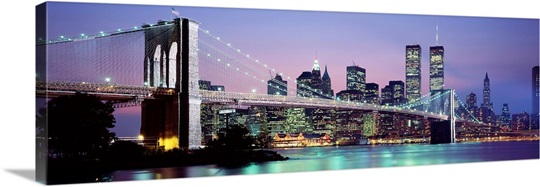 Bridge across a river lit up at dusk, Brooklyn Bridge, East River, World Trade Center, Wall Street, Manhattan, New York City, New York State