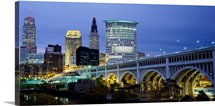 Bridge in a city lit up at dusk, Detroit Avenue Bridge, Cleveland, Ohio
