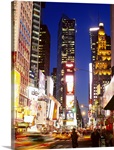 Buildings in a city lit up at dusk, Times Square, Manhattan, New York City, New York State