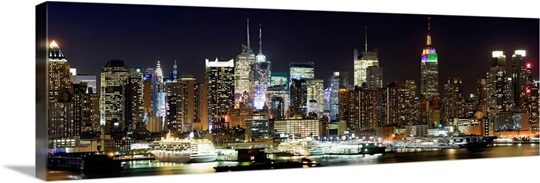 Buildings in a city lit up at night, Hudson River, Midtown Manhattan, Manhattan, New York City, New York State,