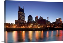 Buildings lit up at dusk at the waterfront, Cumberland River, Bell South Tower, Nashville, Tennessee