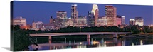 Buildings lit up at night in a city, Minneapolis