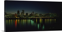 Buildings lit up at night, Willamette River, Portland, Oregon