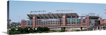 Cable car passing by a stadium, M&amp;T Bank Stadium, Baltimore, Maryland