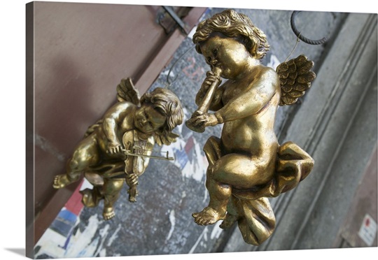 Close-up of two golden cherubs, Naples, Campania, Italy
