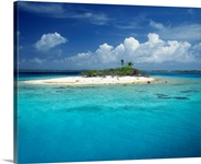 Clouds over an island, Rangiroa, French Polynesia