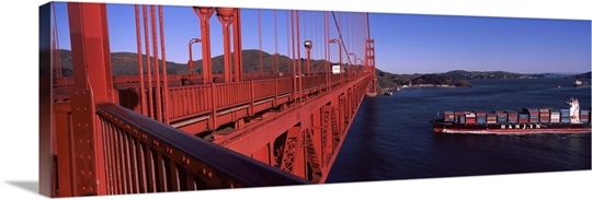 Container ship passing under a suspension bridge Golden Gate Bridge San Francisco Bay San Francisco California