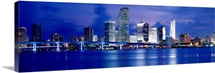 Florida, Miami, Panoramic view of an urban skyline at night