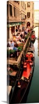 Gondolas moored outside of a cafe, Venice, Italy