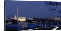 High angle view of government buildings lit up at dusk, Washington Monument, Lincoln Memorial, Capitol Building, Washington DC