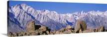 Hiker standing on a rock, Lone Pine, Californian Sierra Nevada, California