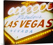 Low angle view of a welcome sign lit up at night, Las Vegas, Nevada
