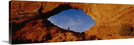 Low angle view of person mountain biking, Utah