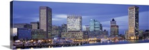 Maryland, Baltimore, Panoramic view of an urban skyline at twilight
