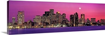Massachusetts, Boston, View of an urban skyline by the shore at night