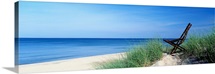 Michigan, Holland, beach chair overlooking Lake Michigan