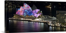 Opera house lit up at night, Sydney Opera House, Sydney, New South Wales, Australia