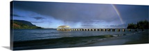 Rainbow over a pier, Hanalei, Kauai, Hawaii