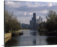 Reflection of buildings in a lagoon, Lincoln Park Lagoon, Lincoln Park, Chicago, Cook County, Illinois,