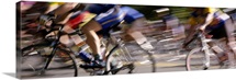 Side profile of a group of people cycling