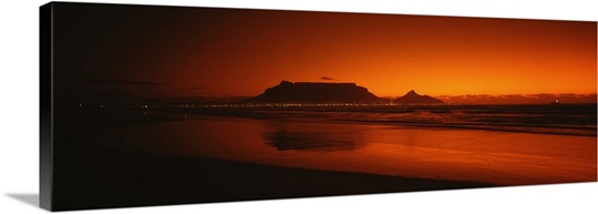 Silhouette of Table Mountain at sunset, Table Bay, Bloubergstrand, Cape Winelands, Western Cape Province, South Africa