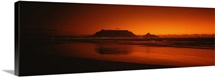 Silhouette of Table Mountain at sunset, Table Bay, Bloubergstrand, Cape Winelands, Western Cape Province, South Africa