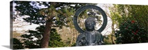 Statue of Buddha in a park, Japanese Tea Garden, Golden Gate Park, San Francisco, California