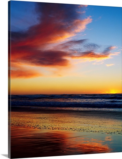 Sunset And Clouds Over Pacific Ocean