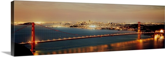 Suspension bridge lit up at dusk Golden Gate Bridge San Francisco Bay San Francisco California