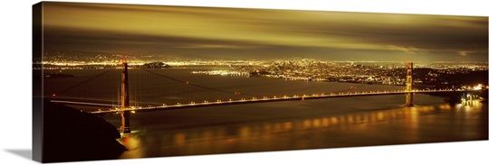 Suspension bridge lit up at dusk, Golden Gate Bridge, San Francisco, California,