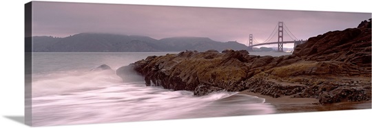 Waves breaking on rocks, Golden Gate Bridge, Baker Beach, San Francisco, California