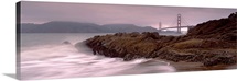 Waves breaking on rocks, Golden Gate Bridge, Baker Beach, San Francisco, California