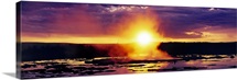 Wyoming, Yellowstone National Park, Great Fountain Geyser, Cloudscape over a landscape during sunset