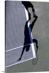 Shadow of tennis player serving