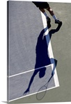 Shadow of tennis player serving