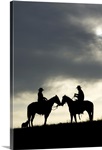 Cowboy and cowgirl silhouette at sunset, Yosemite, California