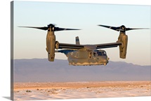 A CV-22 Osprey flies in helicopter mode