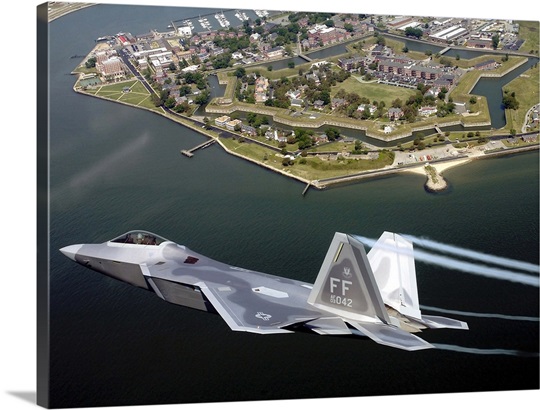 A F/A 22 Raptor flies over Fort Monroe