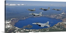 A five-ship aircraft formation flies over Crater Lake, Oregon