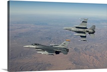 A pair of F-16s fly in formation over Arizona